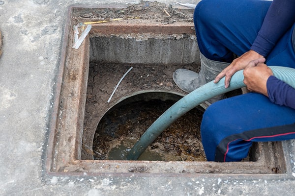 specialized vacuum trucks are used for grease trap pumping to efficiently remove the grease and waste